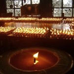 Butter lamps at Dharamshala Monastery Prayer Room