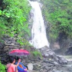 Local women enjoying the Bhagsu Nag Falls